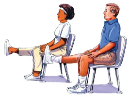 two people sitting in chairs and exercising
